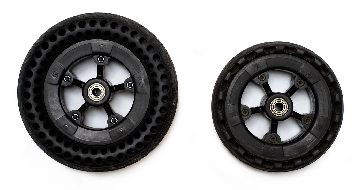 View of both 8 inch and 6 inch rubber wheels for the Rampage electric skateboard