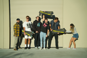 Team Miles with their Phantom electric skateboards 